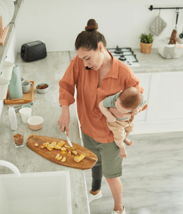 A mom and her toddler together in the kitchen