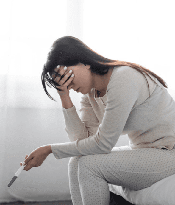 A woman taking a quiet, hard moment
