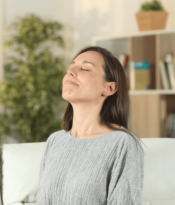 A mom taking a slow breath, finding calm