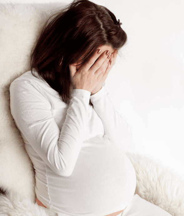 A mom sitting with her feelings in a hard moment