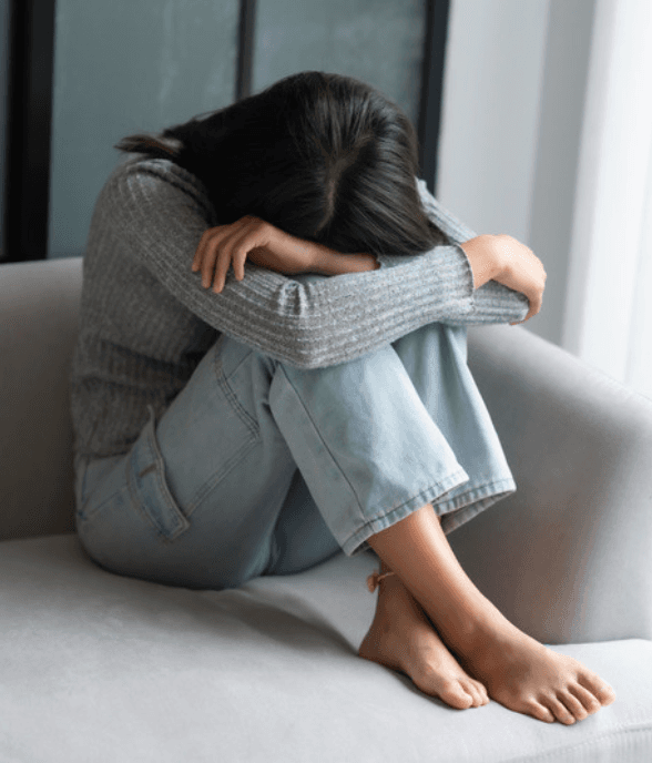 A woman in a quiet, reflective moment
