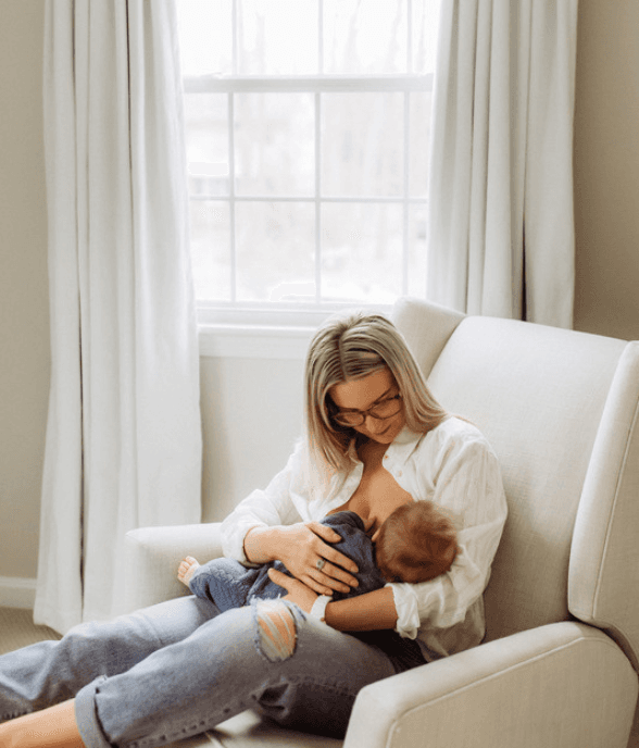 A mom and her baby sharing a calm moment together