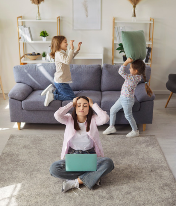 A mom and her children at home